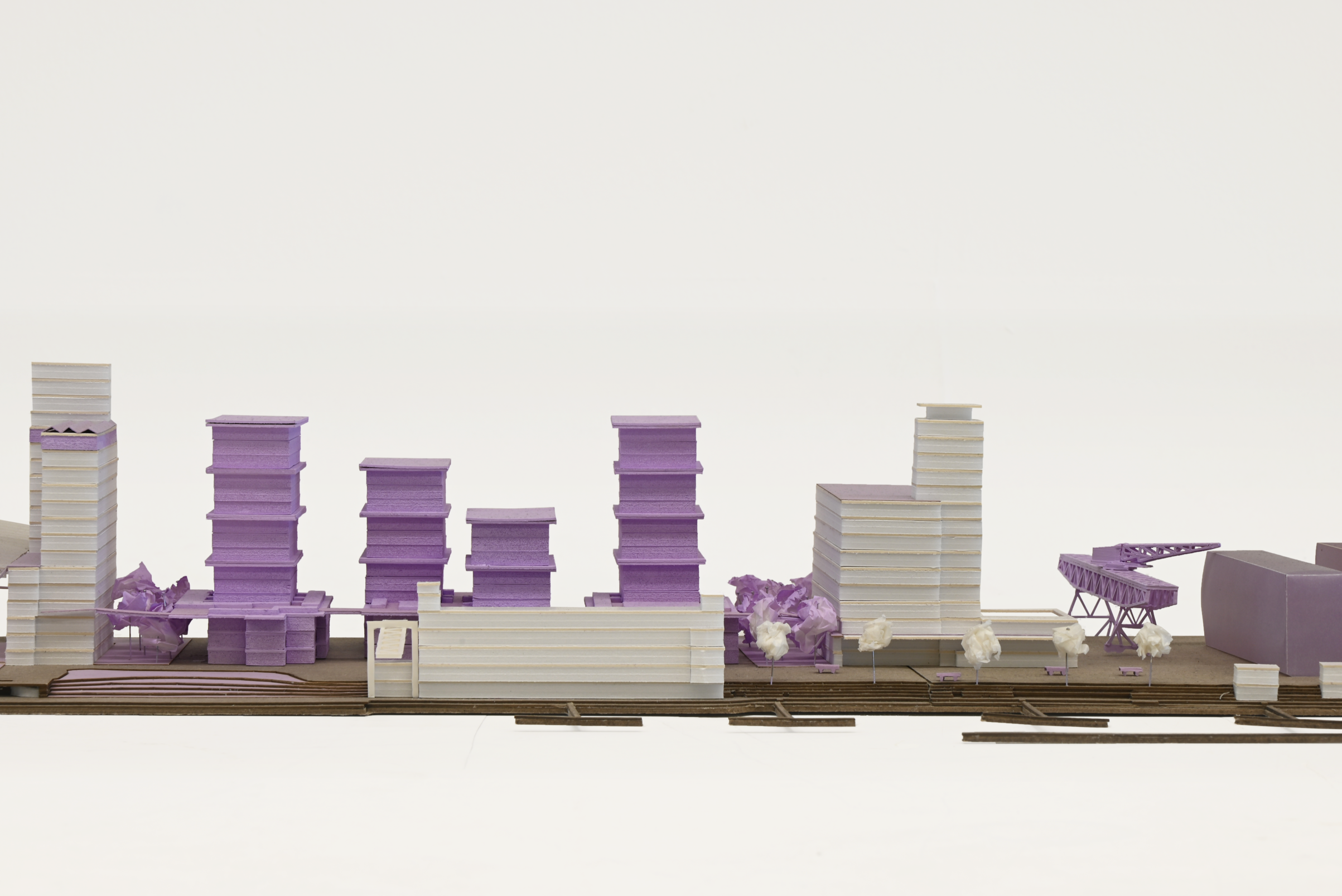 Architectural rendering of an indoor swimming pool area with large windows, exposed concrete columns, and natural light, featuring a a children's play area with water features.